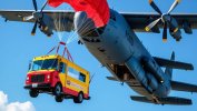 C5 aircraft air dropping a food truck_20250810_193015_0000.jpg