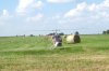 Helicopter and hay bales (1068 x 714).jpg