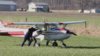 pushing airplane.jpg pushing airplane.jpg