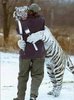 35-tiger-hug-person-knife-fork.jpg