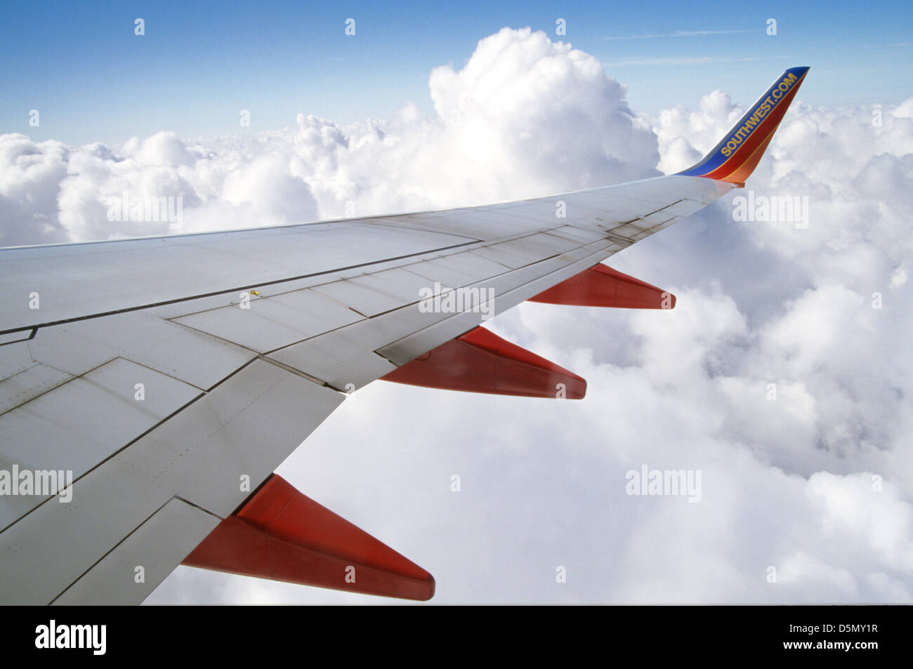 view-out-window-of-southwest-airlines-wing-and-clouds-D5MY1R.jpg