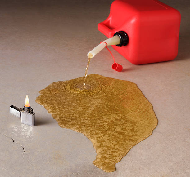 danger-tipped-red-gasoline-can-spilling-with-fire-near.jpg