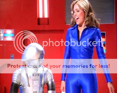 erin_gray_buck_rogers_being_eyed_up_by_twiki.jpg