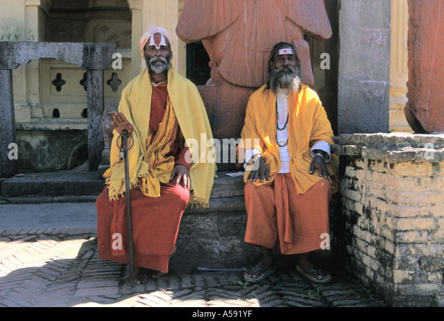 two-sadhu-or-holy-man-in-pashnupati-temple-kathmandu-nepal-a591yf.jpg