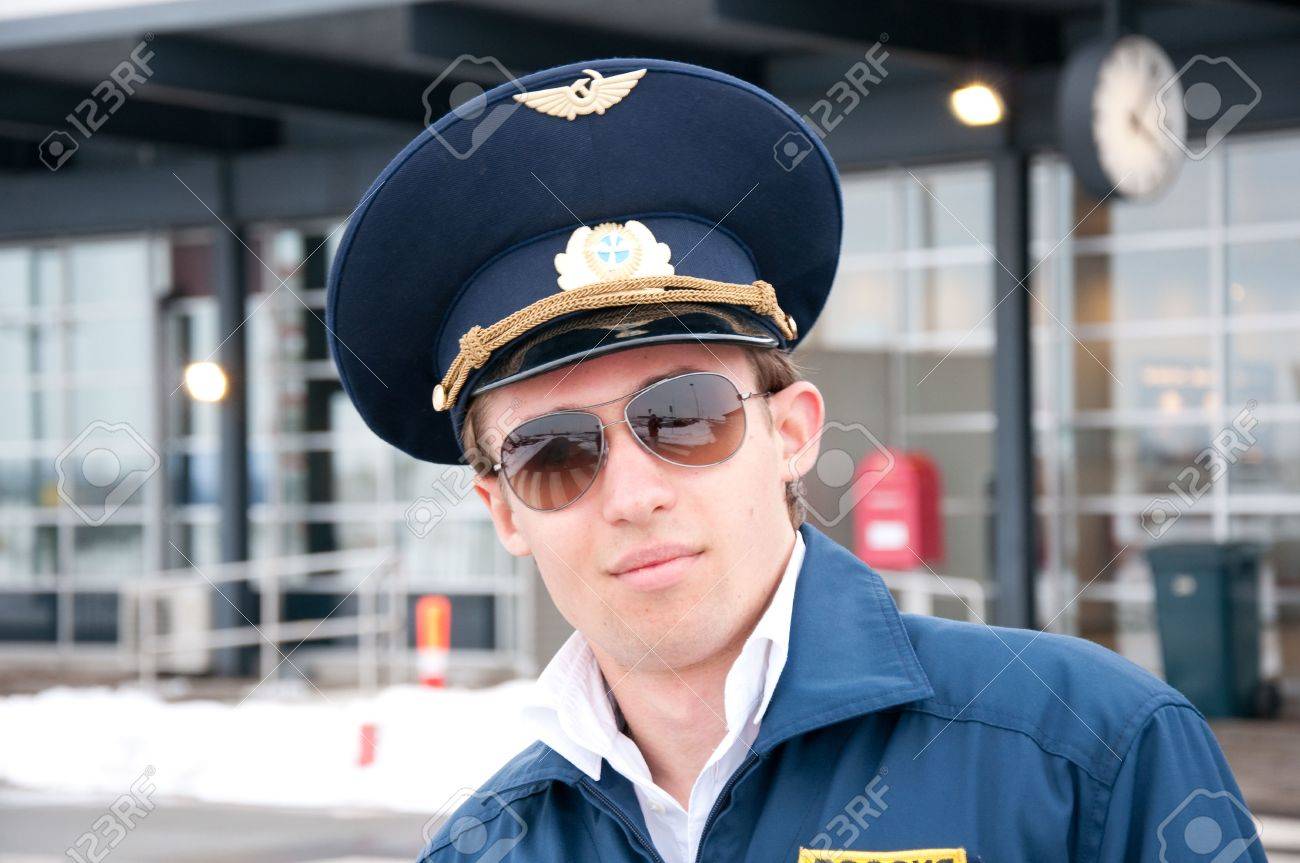 6658936-portrait-young-student-pilot-outside-the-airport-creative-color-Stock-Photo.jpg