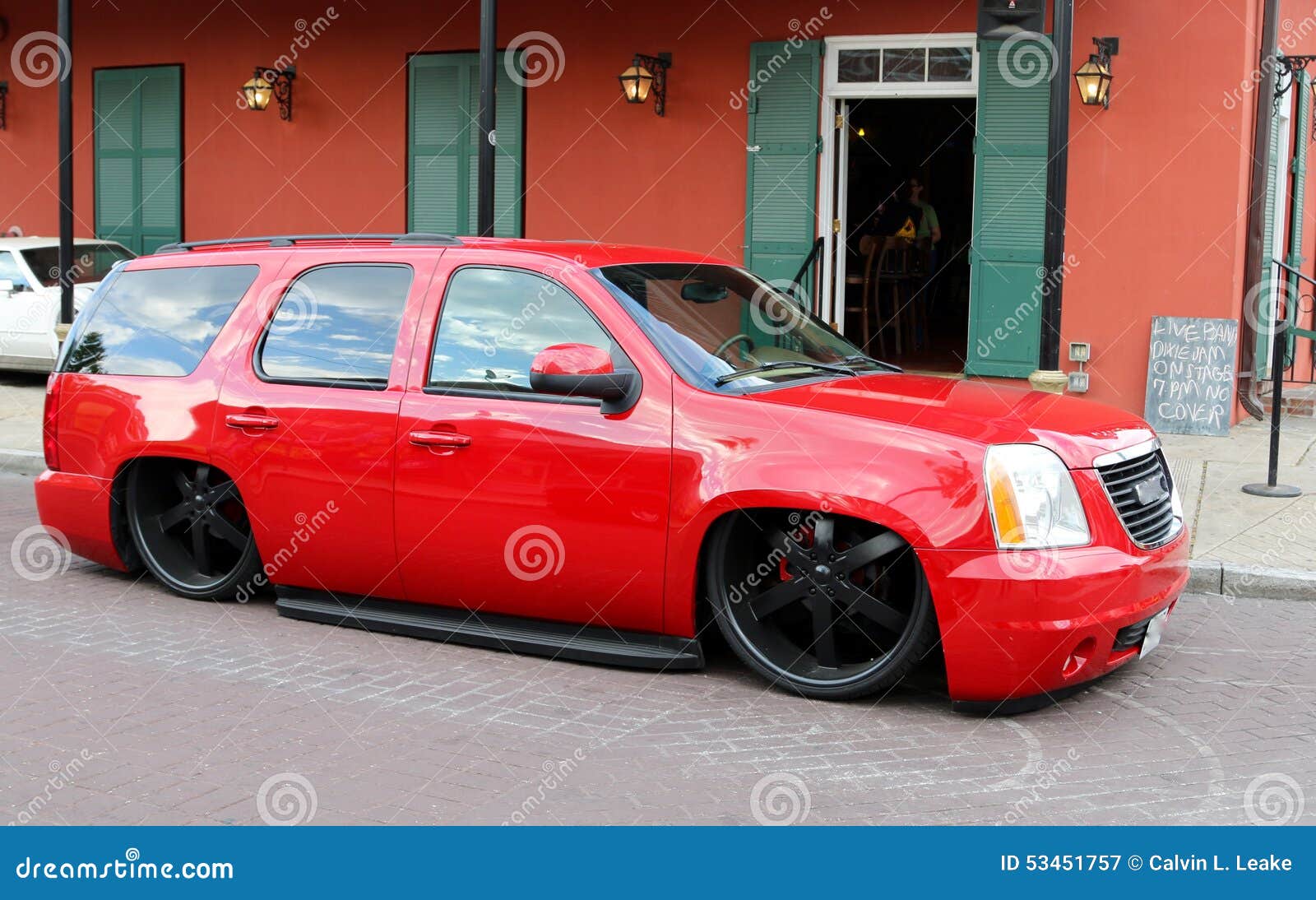 red-gmc-yukon-custom-lowered-springs-s-model-sport-utility-vehicle-fully-inch-wheels-53451757.jpg