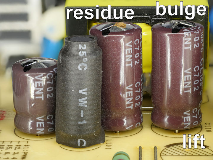 Bad-electrolytic-capacitors-with-residue-buldging-and-lift.jpg